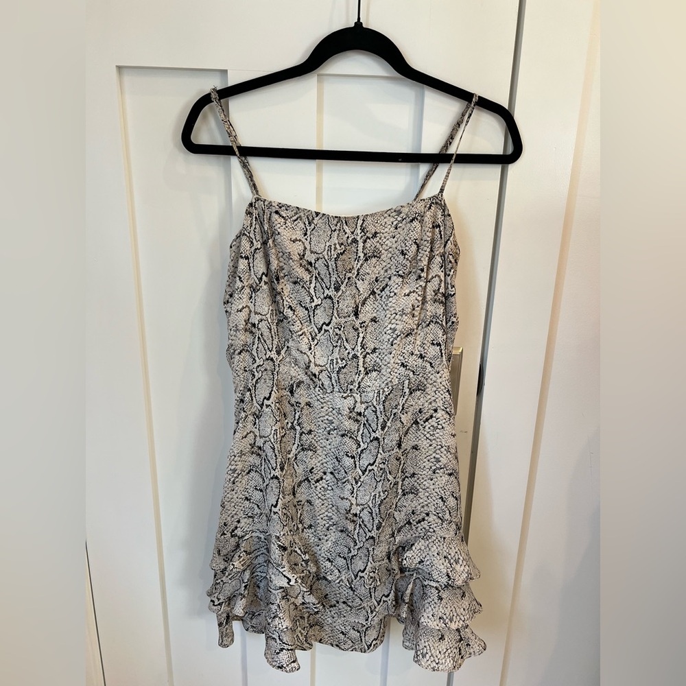 Cute snake skin dress. Great for a date night in college or dinner.
